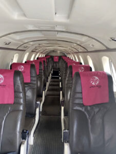 La cabine intérieure du Beechcraft 1900C offre un espace confortable et fonctionnel pour jusqu'à 19 passagers.